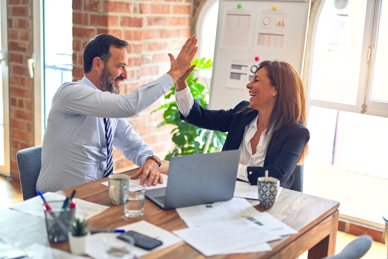 A New Zealander talking with a licensed insurance adviser